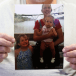 woman holding photograph photo of Hollie's Law mother with two kids