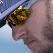childhood domestic violence survivor josh donaldson mvp looking down glasses sadly